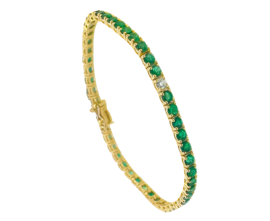 Yellow gold emerald and diamond tennis bracelet