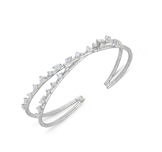 Cross scattered pear and round diamond bracelet